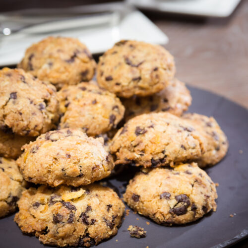 Cookies with raisins on wooden table